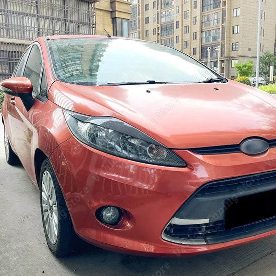 👁️‍🗨️ Eyelid Fari Anteriori per Ford Fiesta MK6 / MK6.5 (2008–2017) – Look Sportivo Nero Lucido o Effetto Carbonio